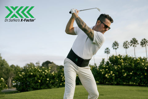 golfer wearing X-Factor Belt golf back support